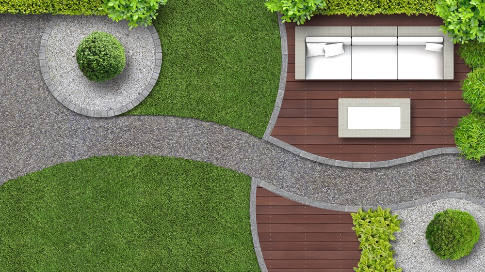 modern, bold garden with styled edging between lawn and stone